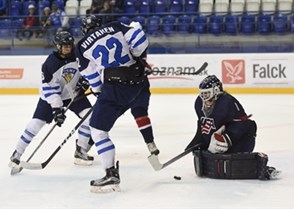 POPRAD, SLOVAKIA - APRIL 23: USA's Dylan St. Cyr #1 makes a save while Finland's Jesse Ylonen #29 and Santeri Virtanen #22 look on during gold medal game action at the 2017 IIHF Ice Hockey U18 World Championship. (Photo by Andrea Cardin/HHOF-IIHF Images)